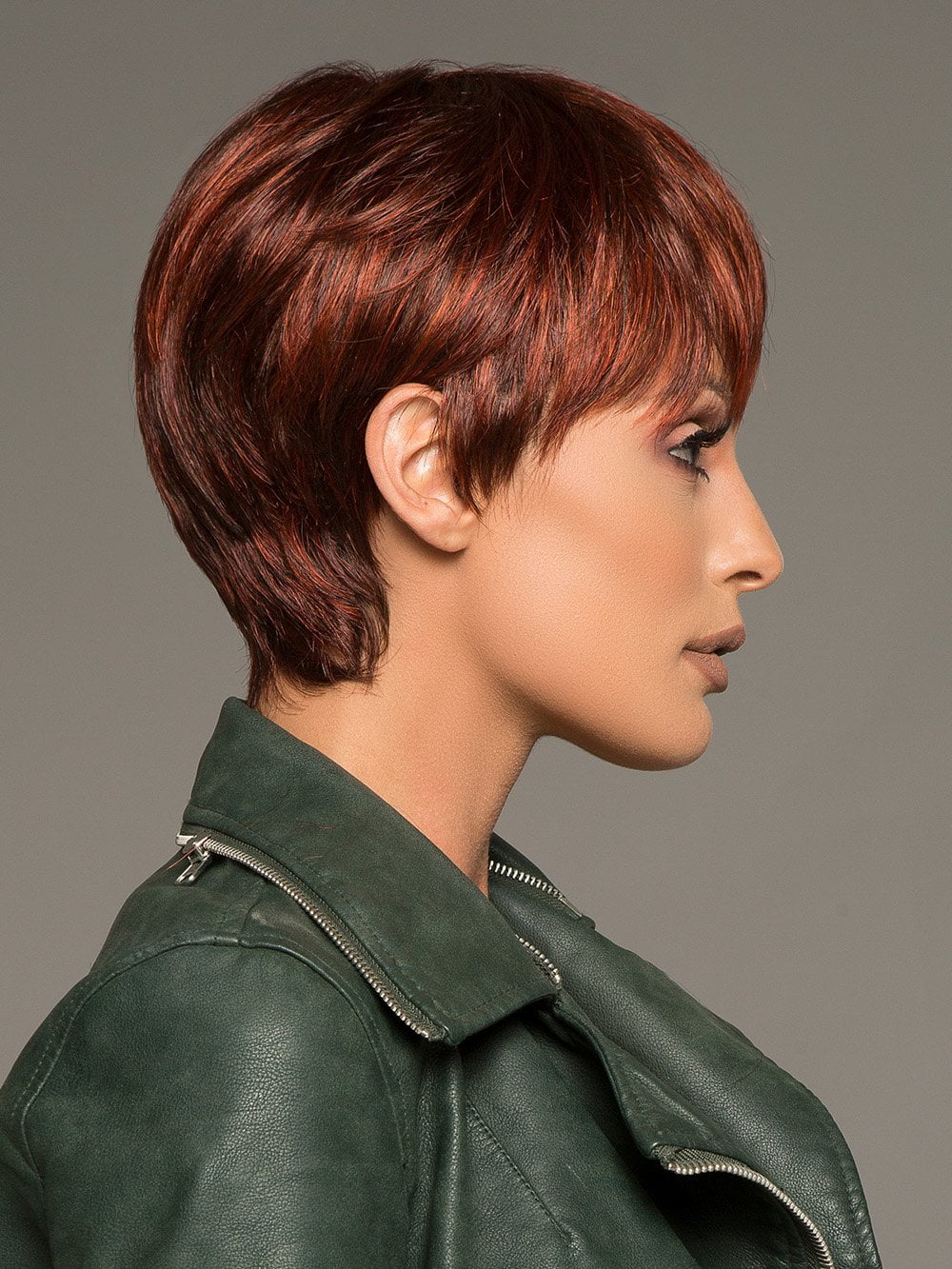 Layers on the top and sides are longer and texturized to create a light, feathered look. Use a styling creme to amplify the layers