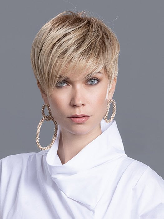 The mini lace front gives a light natural lift in the front hairline and allows you to style the wispy fringe to the left
