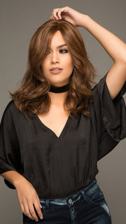 The side bang frames the face and can be trimmed by your stylist