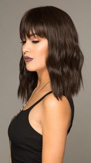 A mid-length cut with full bangs and the perfect wave!