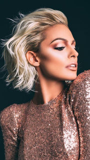 The lace front feature allows you to style the hair back and off of the face. Model's front bio hairline was blended with wig for fashion photos