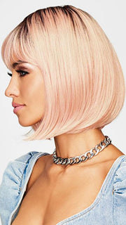 Have your hairstylist customize the bang and style the Tru2Life heat-friendly synthetic hair with a curling iron or flat iron