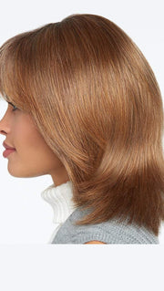 This precision crafted collarbone length cut reflects a popular trend offered in today’s top salons