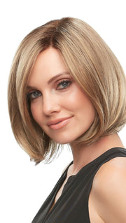 Kristi’s face framing layers and medium length cut are sure to be a hit.