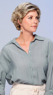 An ultra-lightweight, curly bouffant style with all-over layering, a classic look, flared ends and soft volume
