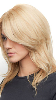 This straight wig has flattering layers flowing over the collarbone