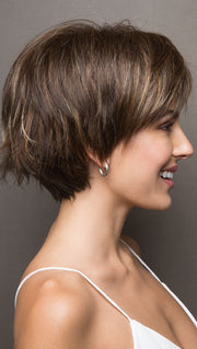 Morgan has a full bang and subtle, but spunky, flared tips at the nape