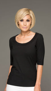 The 100% human hair can be styled like a pixie or a short bob with face-framing layers (This piece has been styled and straightened)