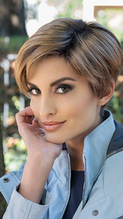 An asymmetric short wig with a feminine shape