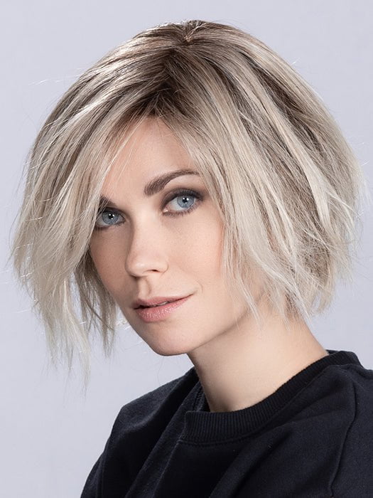 The monofilament top allows the appearance of natural hair growth | The style pictured has been heat styled straight