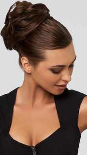 Made with Tru2Life® heat-friendly synthetic hair that can be flat-ironed, curled or blown out.