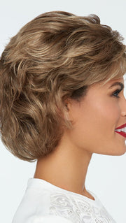 This textured, wavy style features all over layers, soft body and curls. 
