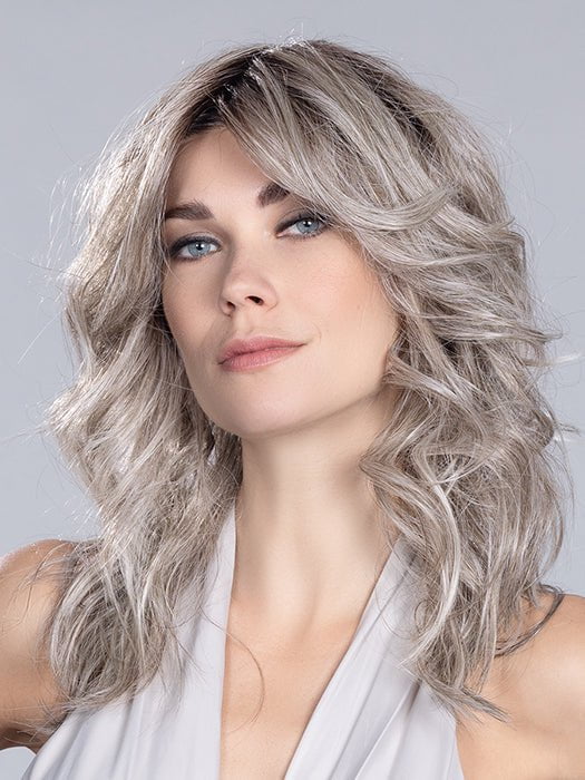 The heat-friendly synthetic fiber allows you to wear the wig however you please: straight, curly, or wavy