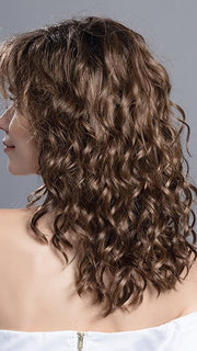 Our recommendation is to use a wide-tooth comb when brushing to keep these beautiful loose curls intact