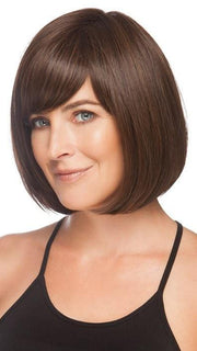 Layers wrap below the jawline giving all face shapes a flattering look | Color: Medium Brown