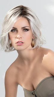 This trendy style has premium cap features, including an extended lace front, monofilament part, and partially hand-tied cap