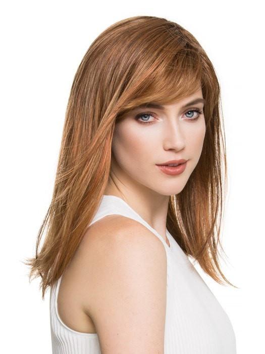 Featuring a full feathered bang and textured ends 