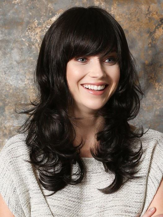 Pretty is a long, layered and wavy styke with a full bang