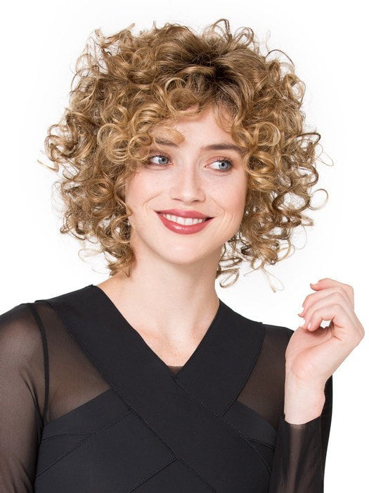 Try combing out the curls for a more full look