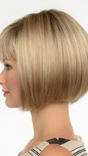Straight choppy layering adds a chic appearance to this classic cut. | Color: Sparkling Champagne