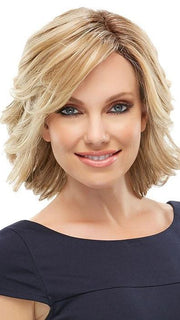 Styled with heat and a larger curling iron | Color: 12FS8