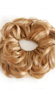 Embellish buns & ponytails with a fall of thick, wavy locks on an elastic wrap.