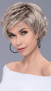 A trendy, playful shag cut with flipped out layers