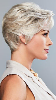 Sweeping layers in the top and crown flow gently away from the face