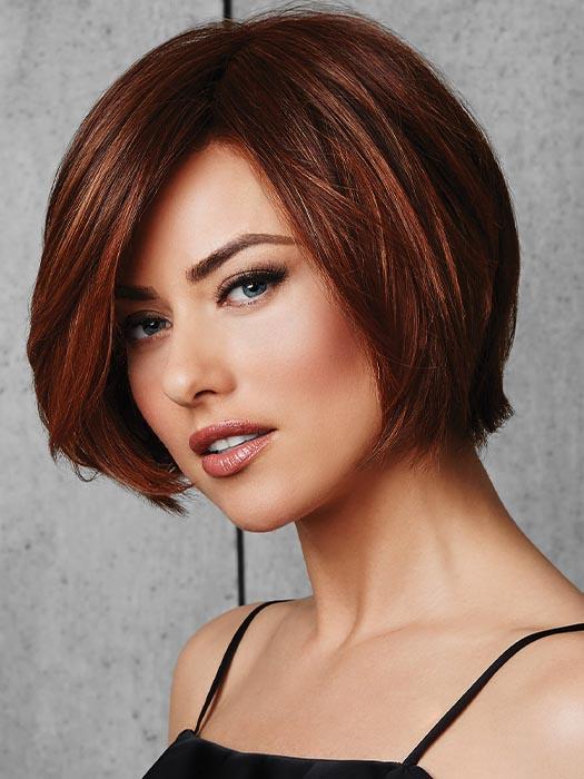 Long, side sweeping fringe and subtly layered, chin-length sides frame the face