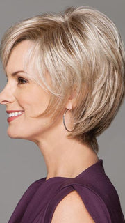  The hand-knotted top gives you even more styling options allowing you to style the hair in any direction