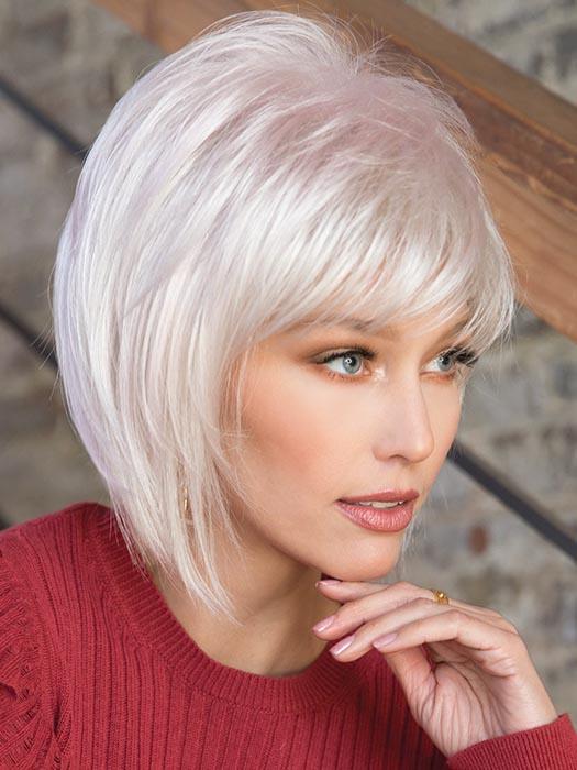 A short, jazzy bob with side swept fringe and textured layers