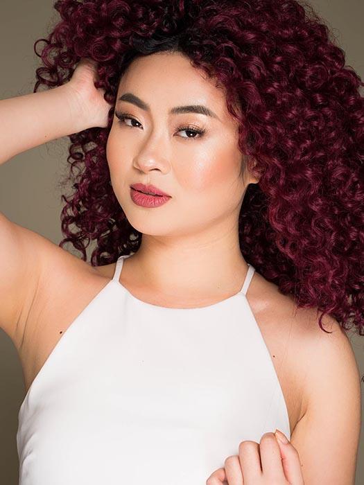 Make a bold statement in this sexy mane of tight, touchable ringlets