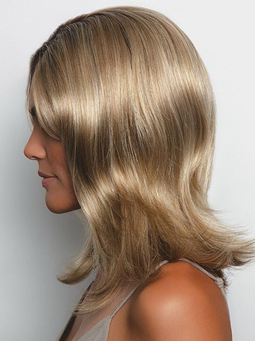 A long layered wavy style with a monofilament top that can be styled and adjusted to fit any mood