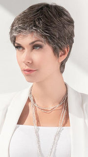 A short, straight pixie wig in Ellen Wille's Hair Society Collection