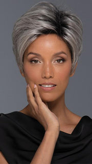 A modern pixie cut wig with a tapered nape