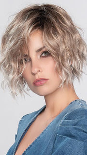 The relaxed beach-like waves give this bob a fun and fresh look for any occasion