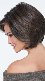 Gentle waves sweep away from the face creating fullness