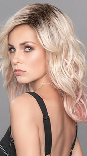 TABU by ELLEN WILLE in ROSE BLONDE ROOTED | Medium Dark Brown Roots that melt into a Pale Golden Blonde with a Mixture of Pink Tones Underneath with Darker Roots
