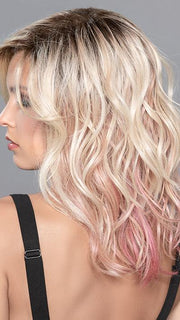 TABU by ELLEN WILLE in ROSE BLONDE ROOTED | Medium Dark Brown Roots that melt into a Pale Golden Blonde with a Mixture of Pink Tones Underneath with Darker Roots