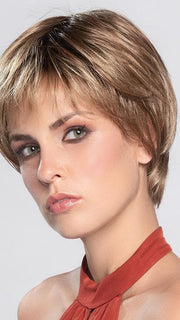Charlotte has a short textured fringe which sits at brow level allowing it to frame your face and blend perfectly into the sides.