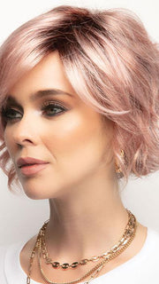 A chin length textured bob with trendy, side swept fringe