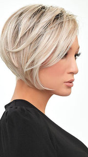 The angled layers of this heat-defiant wig can blow-dried over a round brush for a super sleek bob