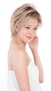 A face flattering bob with feathered layers and wispy ends creates razor-end pieces around the face.