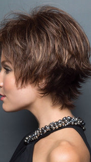 Face framing fringe, that is flattering and the tousled layering throughout adds a fun, fresh look 