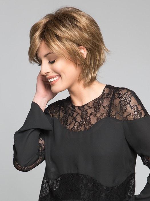 A face flattering bob wig with feathered layers and wispy ends