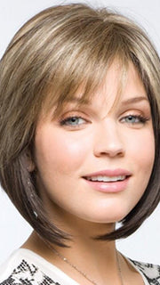 A swingy chin length angled bob with side swept fringe creates a simply beautiful look