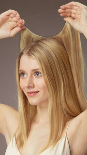 Place halo over your head then blend in your hair