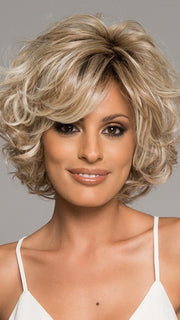 Volume on top with modern styled curls