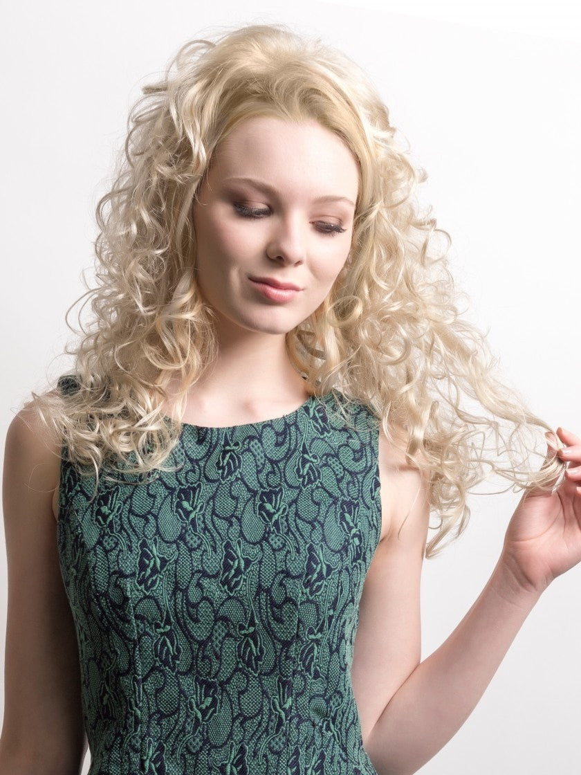 Anemone by Wig Pro is a ¾ fall that, worn with your own hair, creates a cascade of beautiful, romantic locks. This piece attaches with a teeth comb on the top and bottom. 